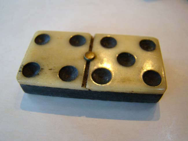 A beautiful set of 19th century bone and ebony dominoes in their original box dated April 27, 1881 — image 3